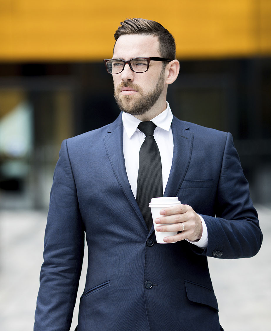 man-with-plastic-cup-near-office-building-2021-09-24-02-55-21-utc.jpg